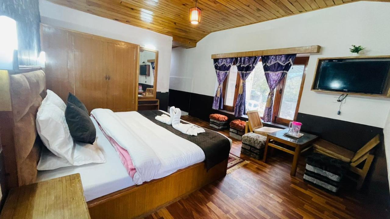 Hotel New Hilltop Inn Manāli Екстериор снимка