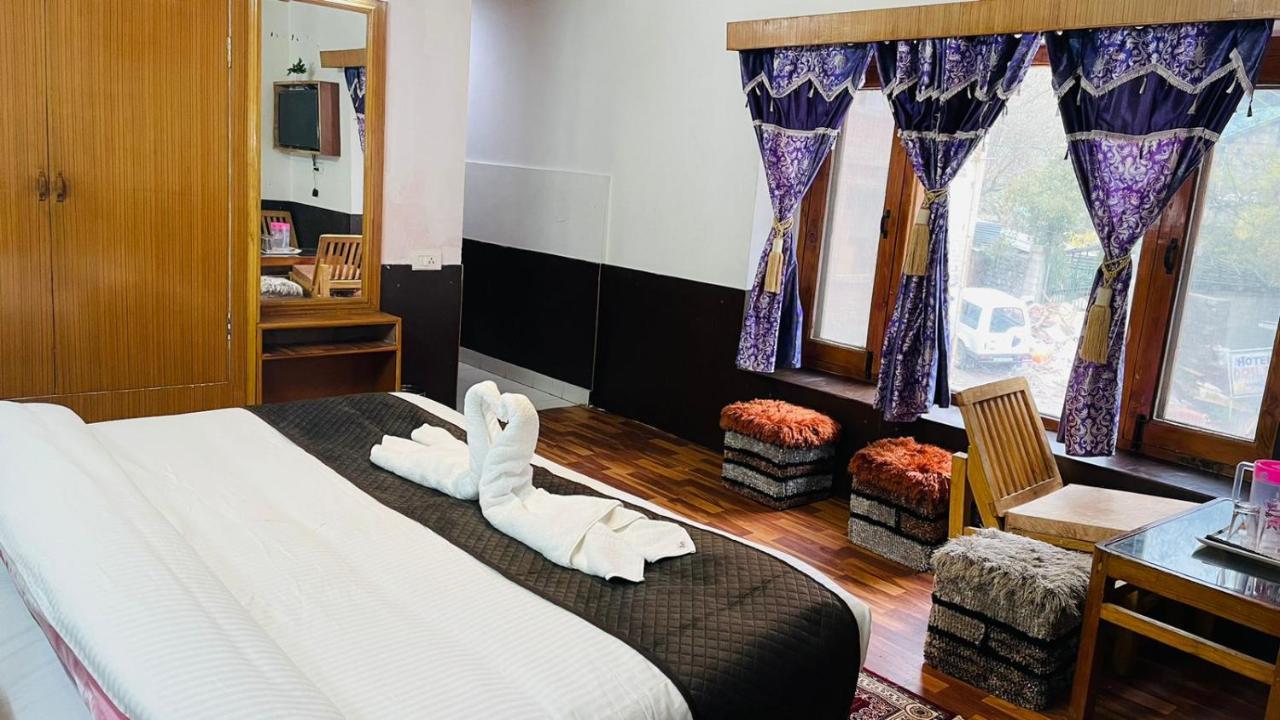 Hotel New Hilltop Inn Manāli Екстериор снимка