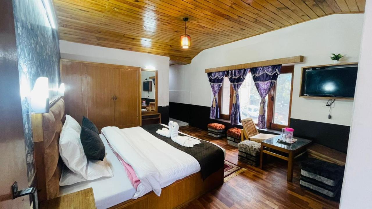 Hotel New Hilltop Inn Manāli Екстериор снимка