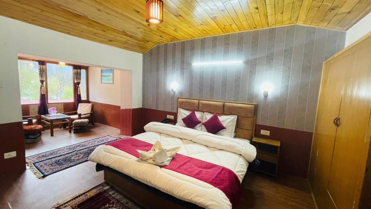 Hotel New Hilltop Inn Manāli Екстериор снимка