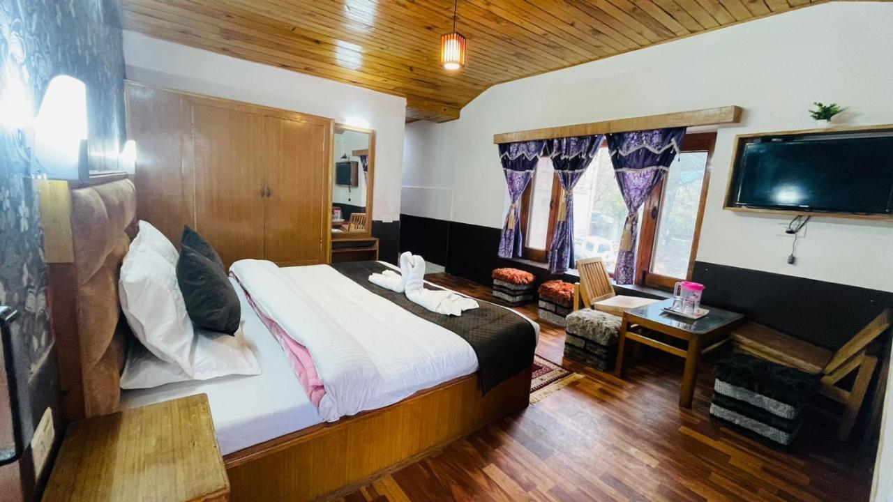 Hotel New Hilltop Inn Manāli Екстериор снимка