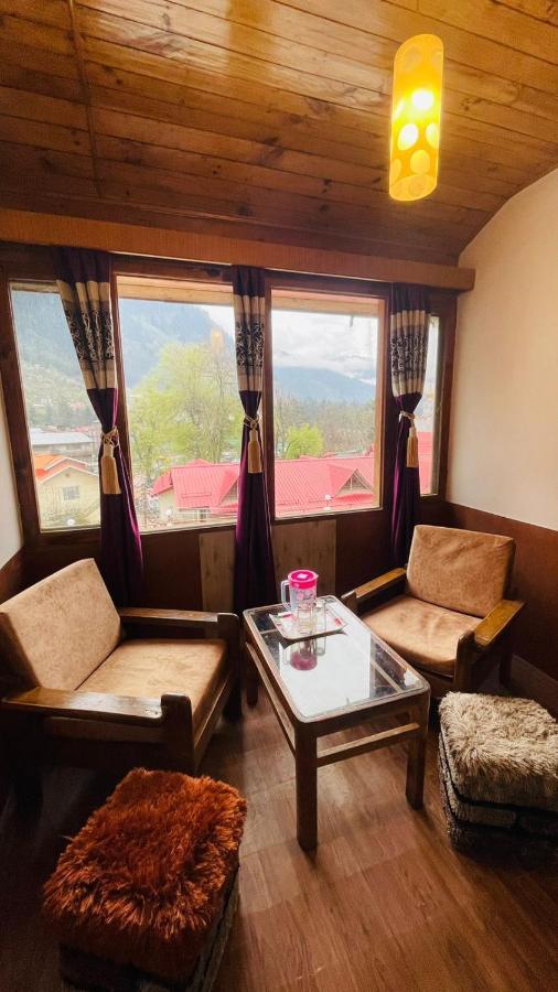 Hotel New Hilltop Inn Manāli Екстериор снимка