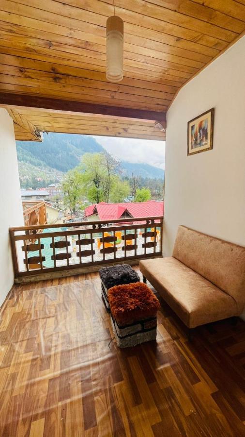 Hotel New Hilltop Inn Manāli Екстериор снимка