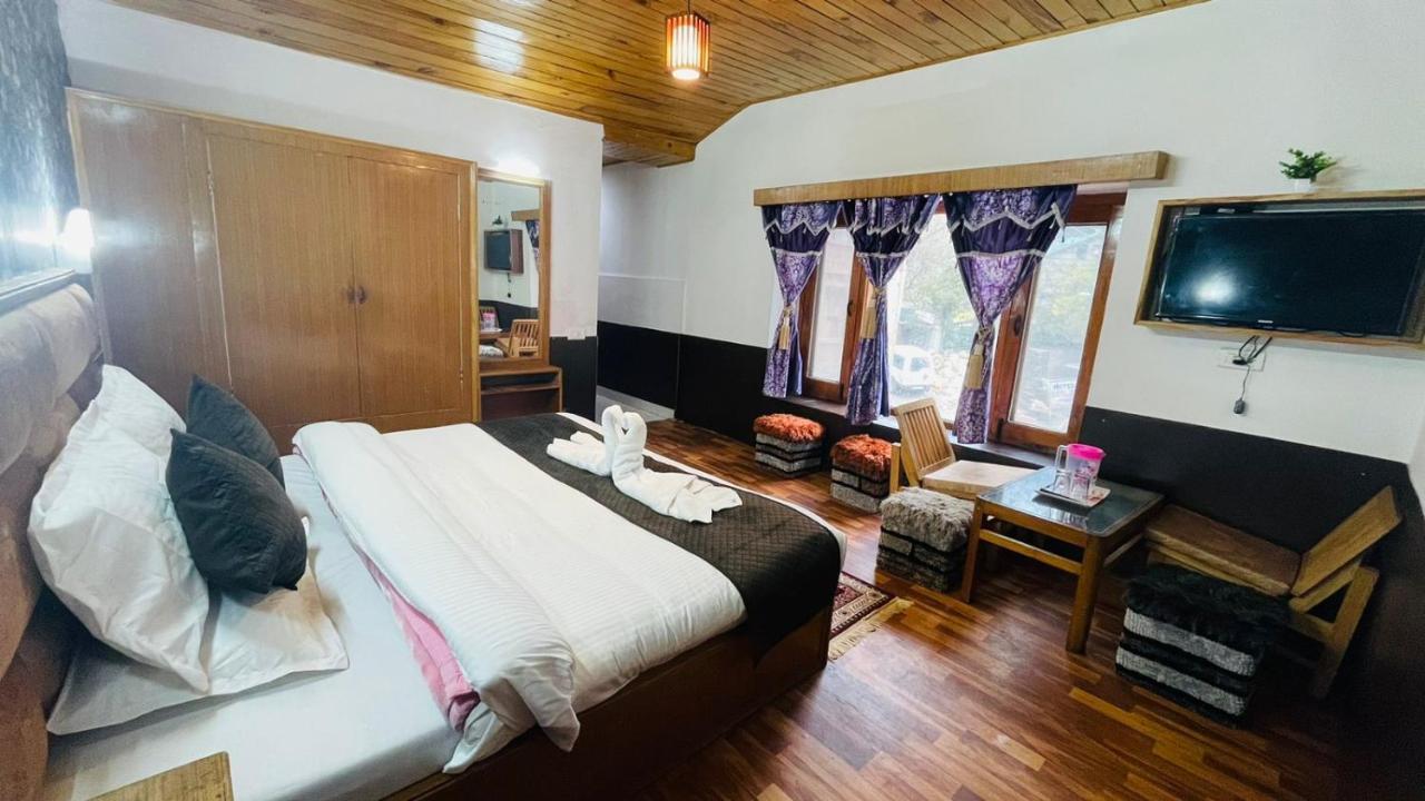 Hotel New Hilltop Inn Manāli Екстериор снимка